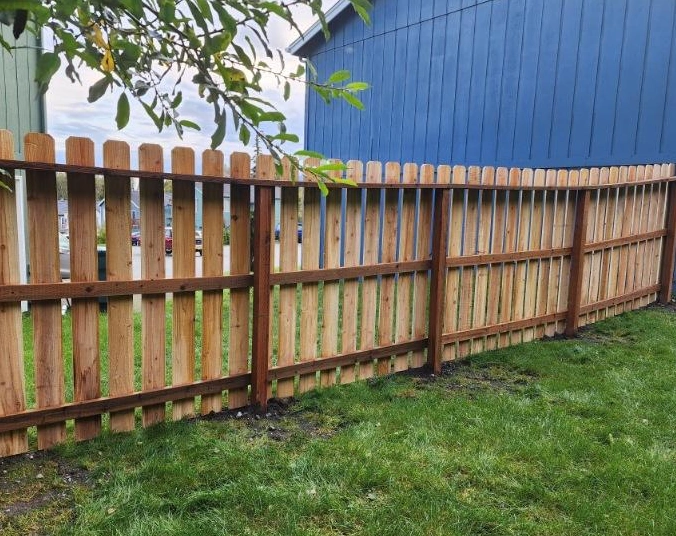 Cedar 3-rail picket fence with traditional spacing built by Maisey Fence